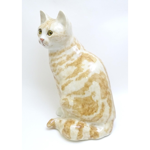 1747 - A large Winstanley model of a seated Ginger cat. Marked under, no. 6. Approx. 12