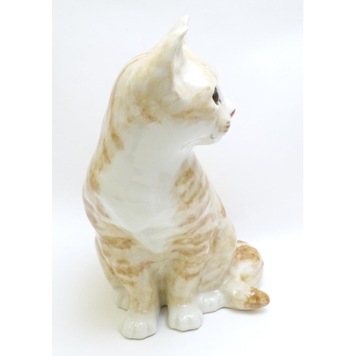 1747 - A large Winstanley model of a seated Ginger cat. Marked under, no. 6. Approx. 12