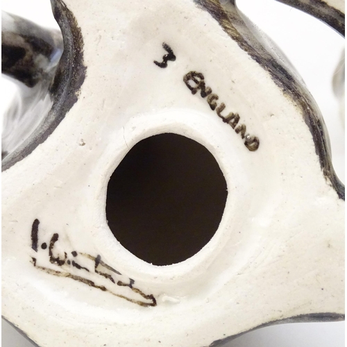 1750 - Two Winstanley models of seated Tabby cats. Each marked under, and numbered 3 / 4. Largest approx. 8... 