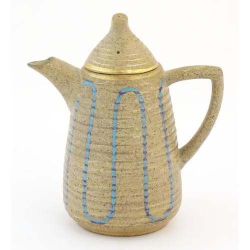 66 - A Clarice Cliff coffee pot in the Goldstone pattern, with blue detail on a mottled ground. Marked un... 