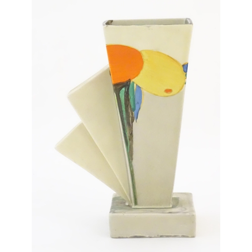 70 - A Clarice Cliff Art Deco angular vase in the Delecia pattern with citrus fruit detail. Marked under ... 