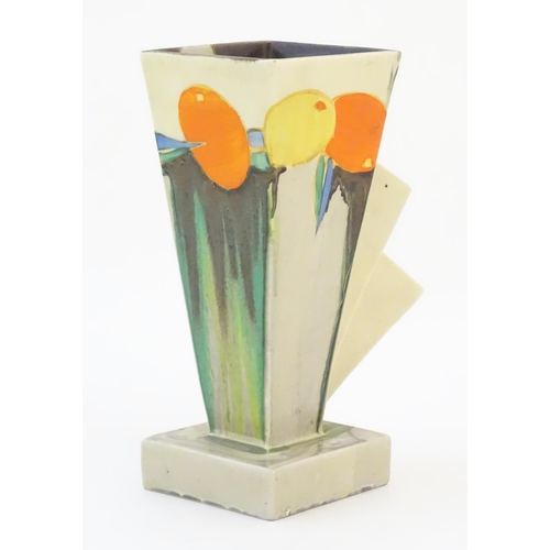 70 - A Clarice Cliff Art Deco angular vase in the Delecia pattern with citrus fruit detail. Marked under ... 