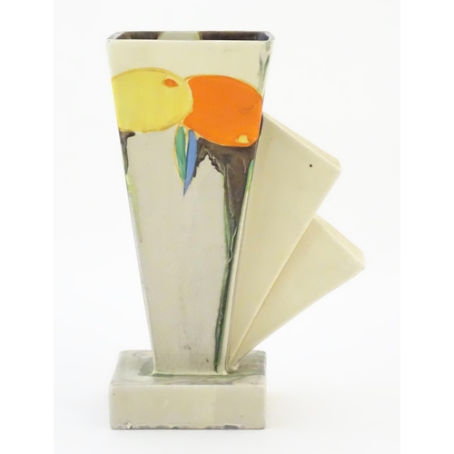 70 - A Clarice Cliff Art Deco angular vase in the Delecia pattern with citrus fruit detail. Marked under ... 