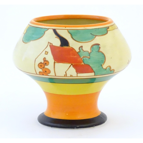 73 - A Clarice Cliff pedestal bowl in the Red Roofs pattern, decorated with stylised flowers. Marked unde... 