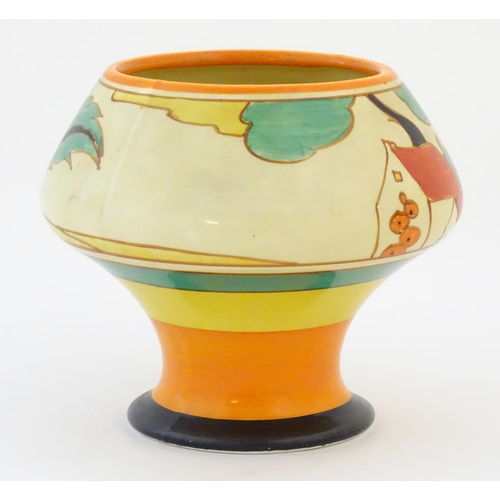 73 - A Clarice Cliff pedestal bowl in the Red Roofs pattern, decorated with stylised flowers. Marked unde... 