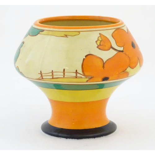 73 - A Clarice Cliff pedestal bowl in the Red Roofs pattern, decorated with stylised flowers. Marked unde... 