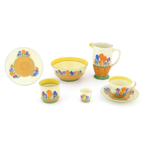 78 - A quantity of Clarice Cliff early morning / breakfast wares in the Crocus pattern, comprising milk j... 