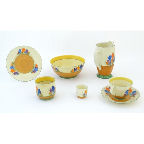 78 - A quantity of Clarice Cliff early morning / breakfast wares in the Crocus pattern, comprising milk j... 