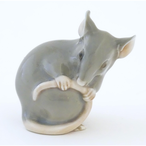 81 - A Bing & Grondahl model of a mouse, no. 1801. Marked under. Approx. 1 3/4