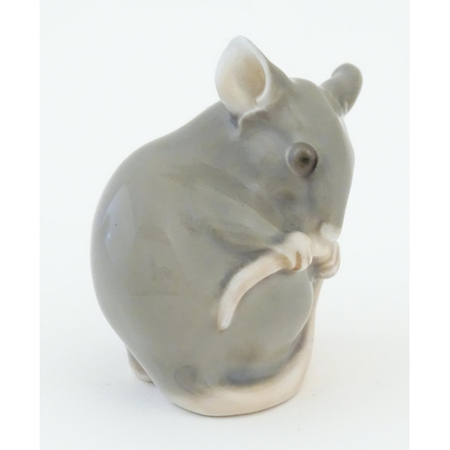 81 - A Bing & Grondahl model of a mouse, no. 1801. Marked under. Approx. 1 3/4