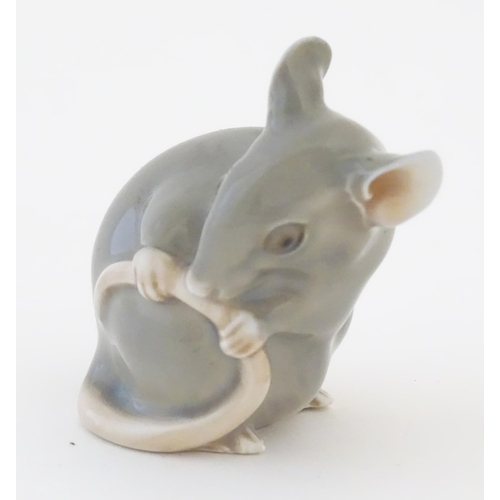 81 - A Bing & Grondahl model of a mouse, no. 1801. Marked under. Approx. 1 3/4