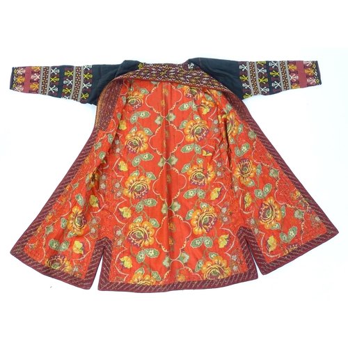 1740 - Vintage fashion / clothing: A hand-made Turkmen Chapan / coat with hand embroidered detail. Chest me... 