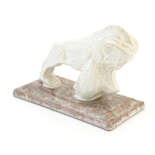 45 - A French Art Deco model of a ram with a crackle glaze on a stepped rectangular base. Impressed marks... 