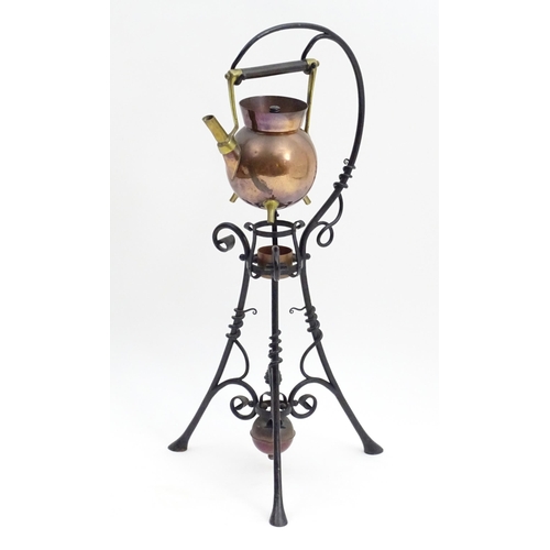 826 - An Arts & Crafts copper and brass spirit kettle on a scrolling wrought iron stand designed by Dr Chr... 