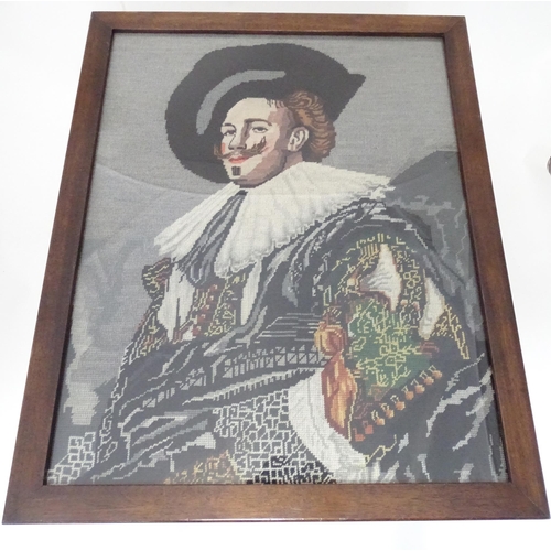 178 - A 20thC firescreen with inset tapestry / woolwork depicting The Laughing Cavalier after Frans Hals. ... 