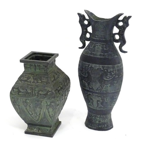 184 - Two Oriental cast vases with stylised animal decoration