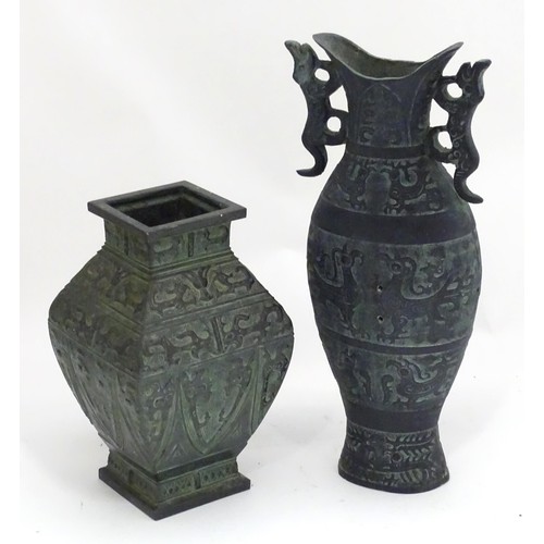 184 - Two Oriental cast vases with stylised animal decoration