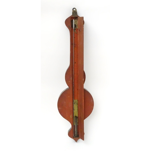 224 - A mahogany wheel barometer with satinwood stringing,  thermometer reading freezing to blood heat and... 