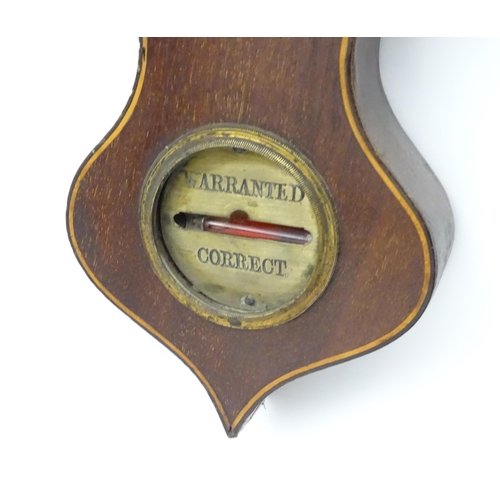 224 - A mahogany wheel barometer with satinwood stringing,  thermometer reading freezing to blood heat and... 