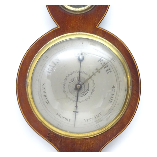 224 - A mahogany wheel barometer with satinwood stringing,  thermometer reading freezing to blood heat and... 