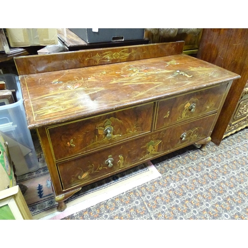 271 - An Oriental low chest comprising two short over one long drawer with Oriental scene decoration. 45