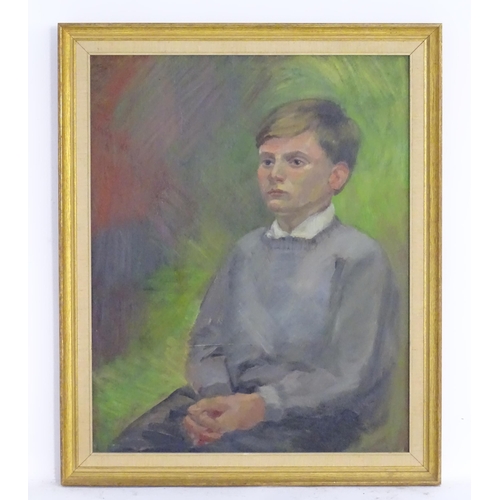 288 - 20th century, Oil on board, A portrait of a young boy. Approx. 19 1/2