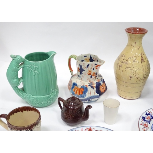 122 - A quantity of assorted ceramics to include a green Sylvac squirrel jug of acorn form, no. 1959; a te... 