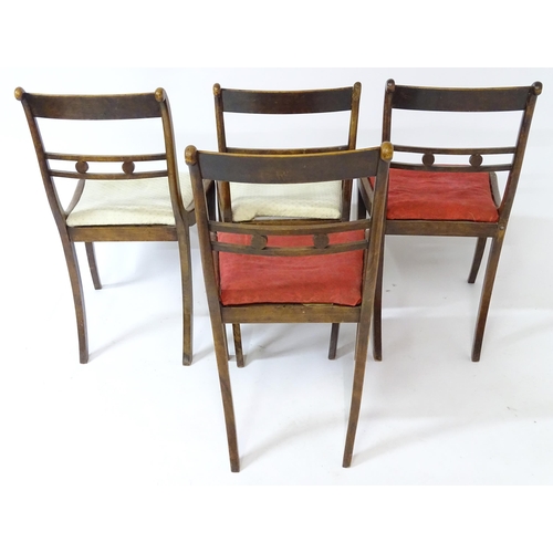 15 - Four regency rosewood chairs with brass inlay. 31