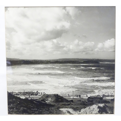 45 - Three monochrome landscape photographs to include a coastal bay with rough sea, trees, etc. Together... 