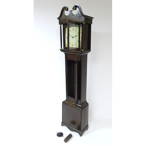 63 - A longcase clock with pained 12