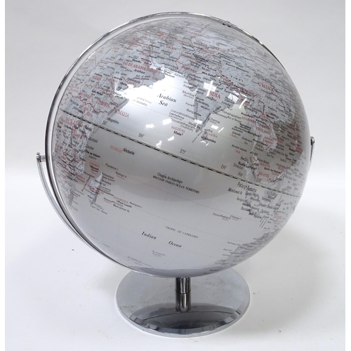 98 - A modern silvered globe on chrome base