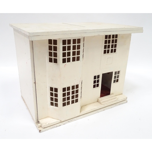 99 - An Art Deco dolls house with sliding front and four rooms within. Approx. 17