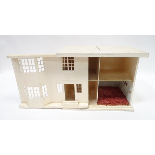 99 - An Art Deco dolls house with sliding front and four rooms within. Approx. 17