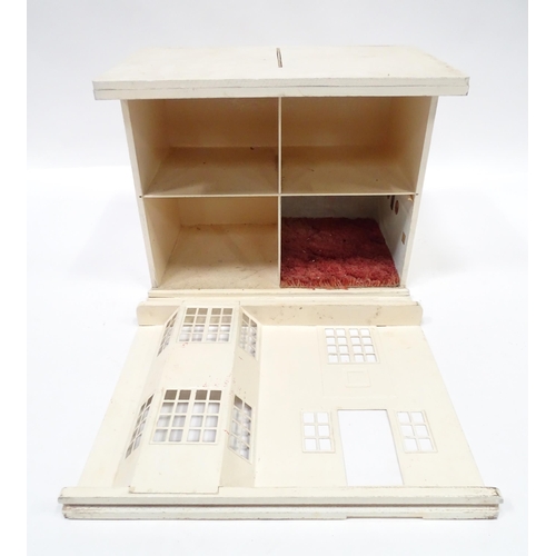 99 - An Art Deco dolls house with sliding front and four rooms within. Approx. 17