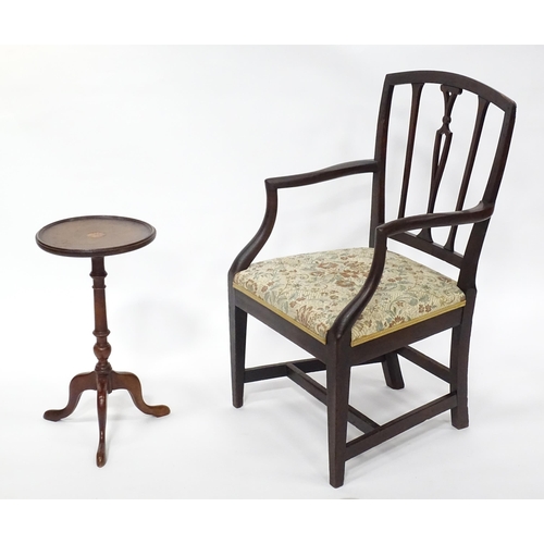 235 - A Hepplewhite design open armchair together with an early 20thC marquetry inlaid wine table. The tab... 