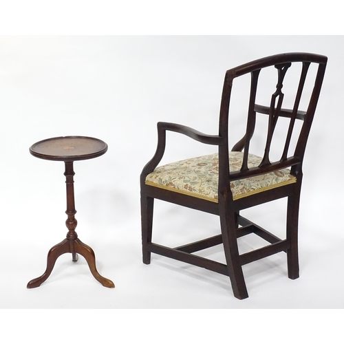 235 - A Hepplewhite design open armchair together with an early 20thC marquetry inlaid wine table. The tab... 