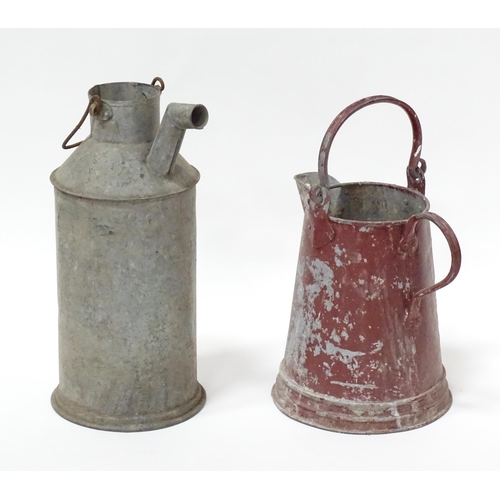 242 - Two barge ware style  galvanised iron water jugs. The tallest approx 17 1/2