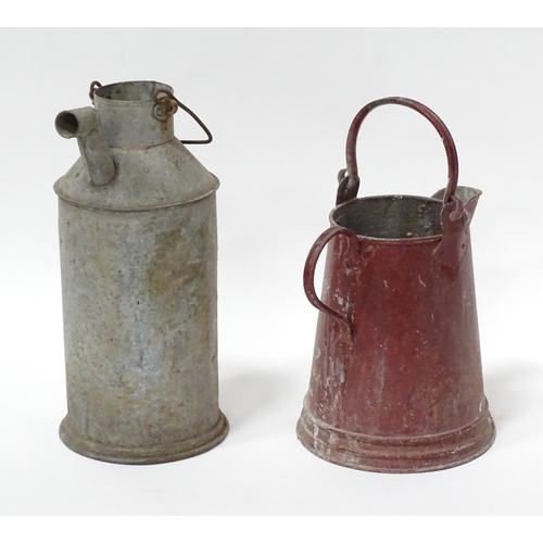 242 - Two barge ware style  galvanised iron water jugs. The tallest approx 17 1/2