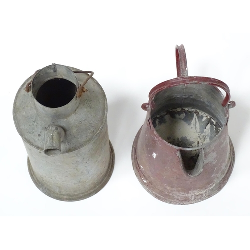 242 - Two barge ware style  galvanised iron water jugs. The tallest approx 17 1/2