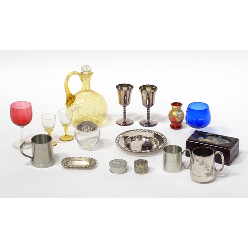 246 - Assorted miscellaneous items to include coloured glass ware, silver plate cups, tankards etc .