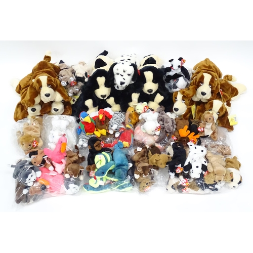 258 - Cuddly Toys : A large quantity of Keel Toys / soft toy dogs etc ,  to include items from the ' Simpl... 