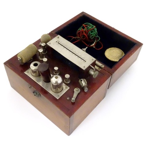 1101 - A mahogany cased Ever-Ready Electric Coil, model no. 290, made by the British electrical specialists... 