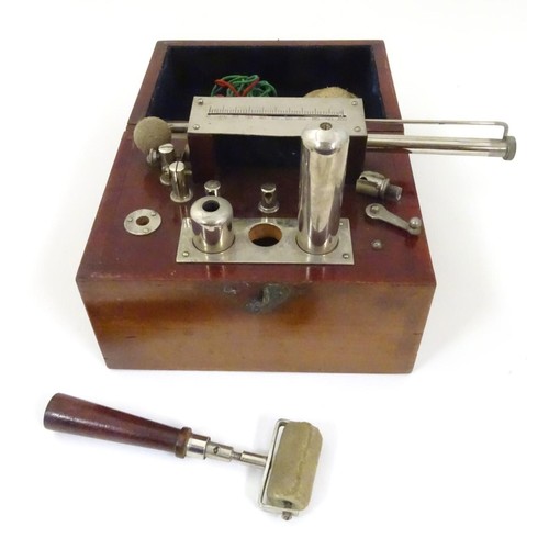 1101 - A mahogany cased Ever-Ready Electric Coil, model no. 290, made by the British electrical specialists... 