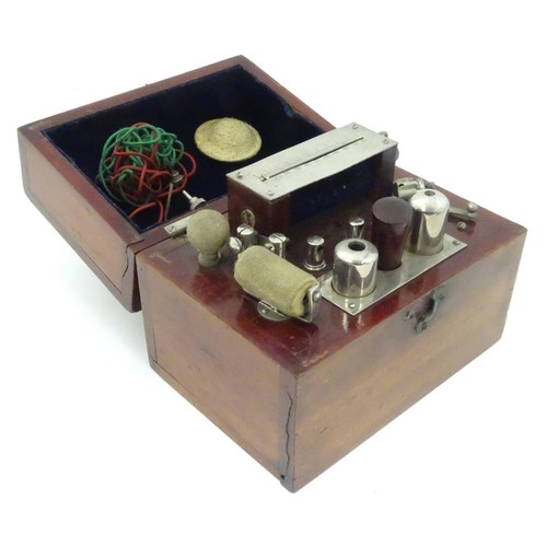 1101 - A mahogany cased Ever-Ready Electric Coil, model no. 290, made by the British electrical specialists... 