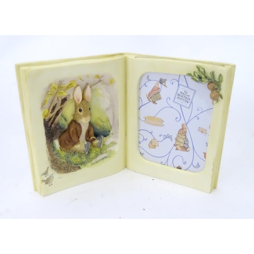 1379 - A The World of Beatrix Potter Benjamin Bunny book formed picture frame. Boxed. Approx. 6 1/2