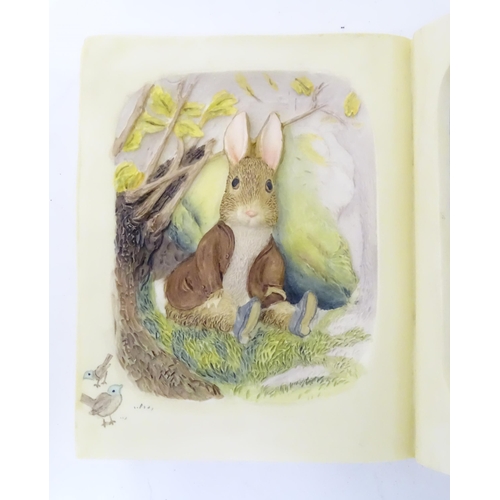 1379 - A The World of Beatrix Potter Benjamin Bunny book formed picture frame. Boxed. Approx. 6 1/2