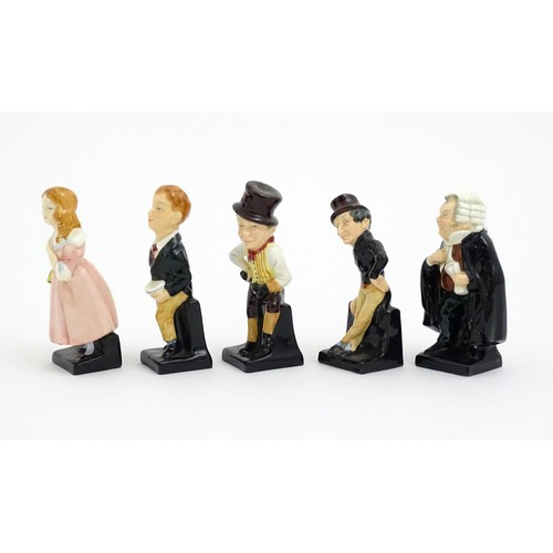 103 - Five Royal Doulton Charles Dickens figures to include Sam Weller, Oliver Twist, Jingle, Buzz Fuzz, a... 