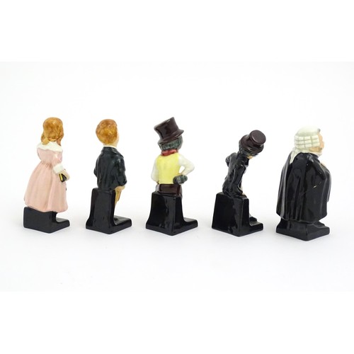 103 - Five Royal Doulton Charles Dickens figures to include Sam Weller, Oliver Twist, Jingle, Buzz Fuzz, a... 