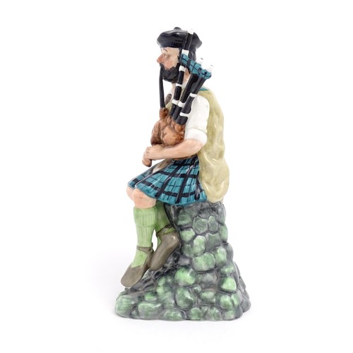 105 - A Royal Doulton figure The Piper, model no. HN2907, modelled by Miachel Abberley. Approx. 8