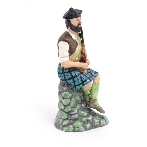 105 - A Royal Doulton figure The Piper, model no. HN2907, modelled by Miachel Abberley. Approx. 8